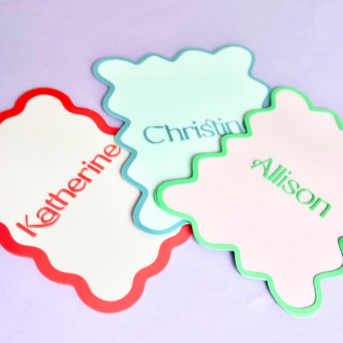 Scalloped Mahjong shufflers in red, blue and green