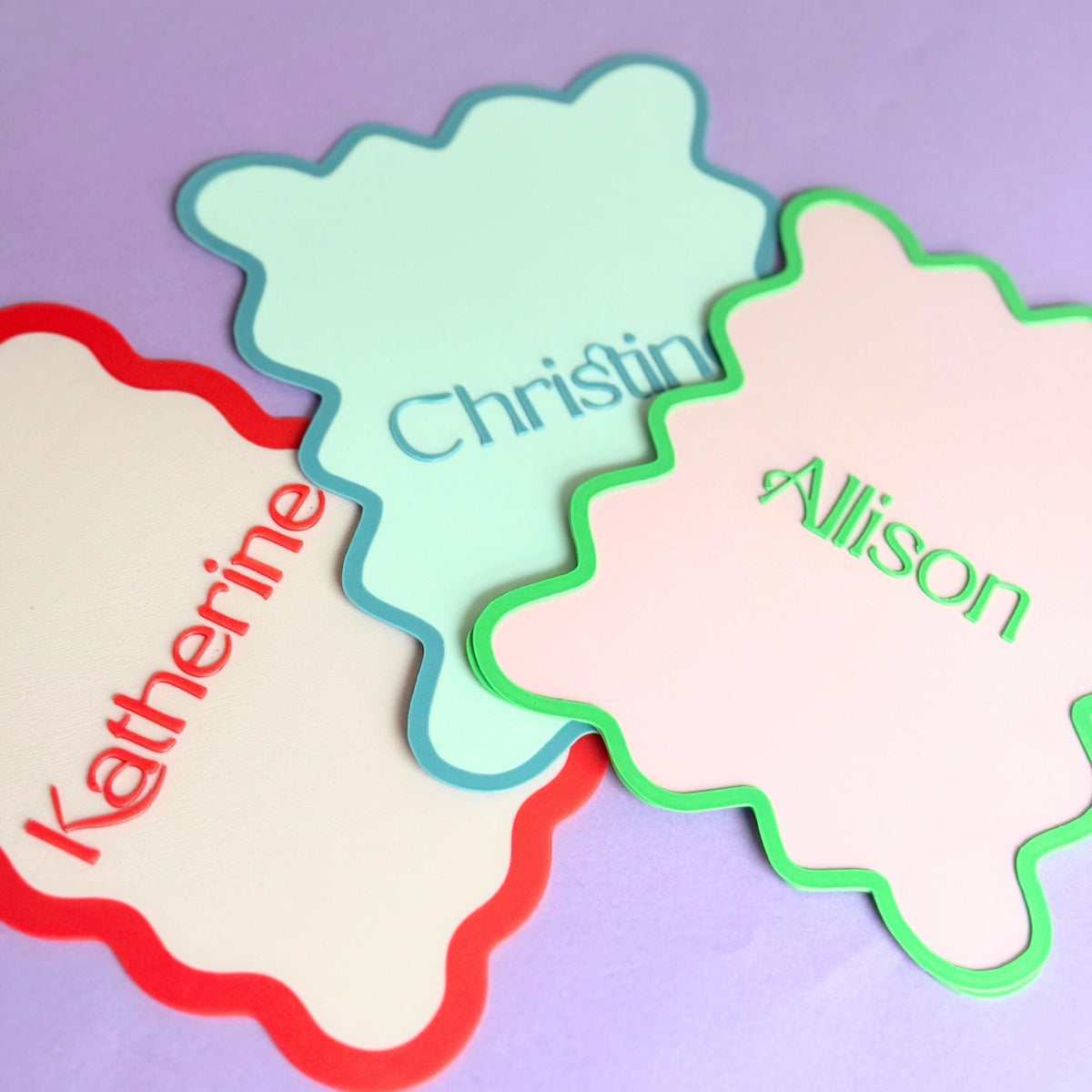 Personalized scalloped Mahjong tile shufflers with names in pastel colors