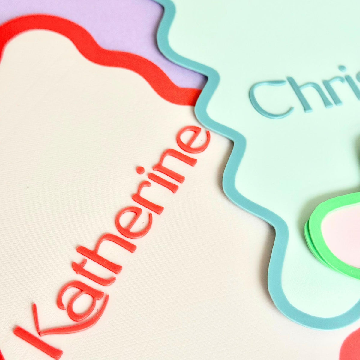 Close-up of layered scalloped Mahjong tile mixer in pastel colors