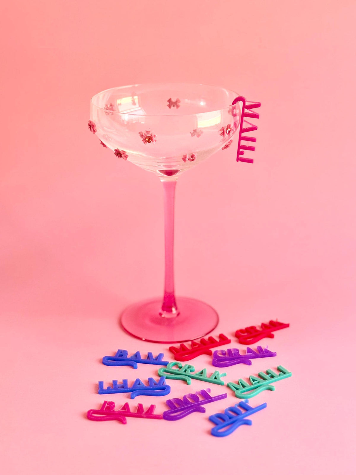 Mahjong drink tag on a champagne glass