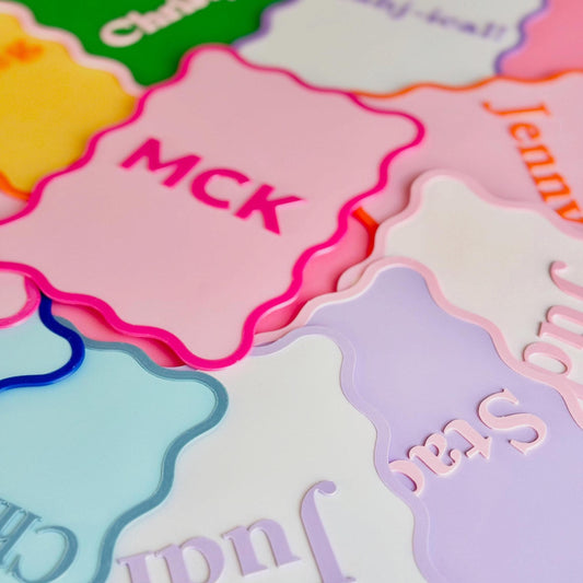 Personalized scalloped Mahjong shufflers in colorful two-tone designs