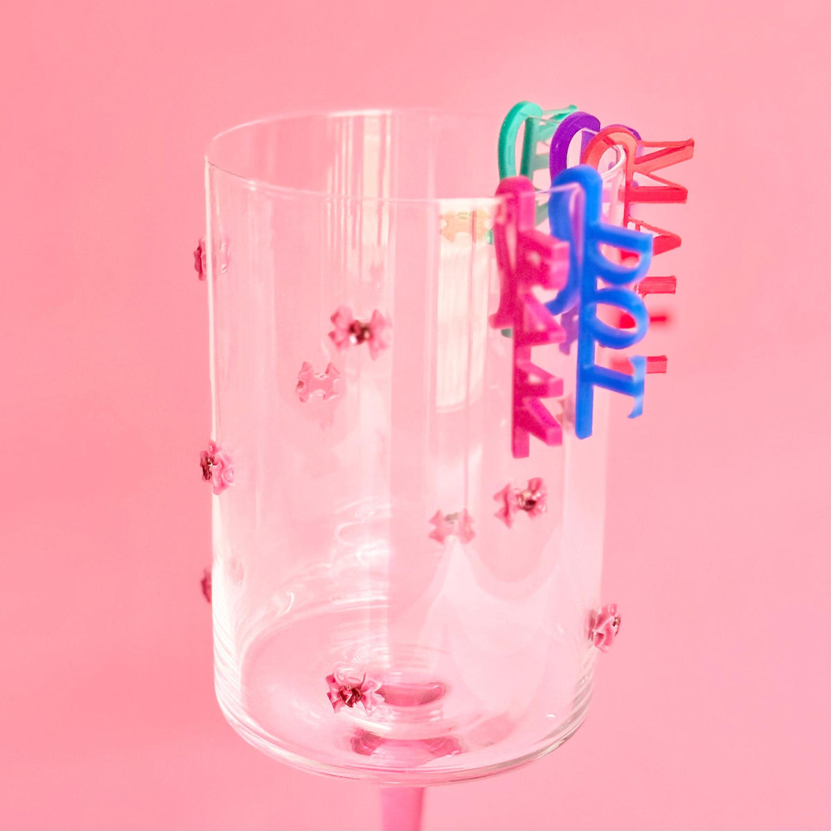 Mahjong beverage tag on a champagne flute