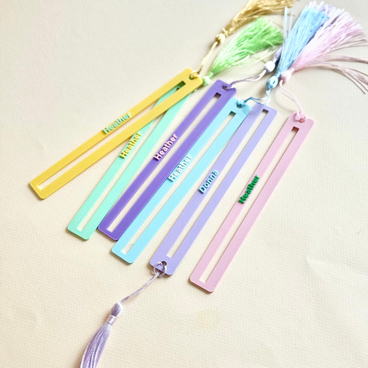 Mahjong line readers with tassels in yellow, mint, purple, blue and pink