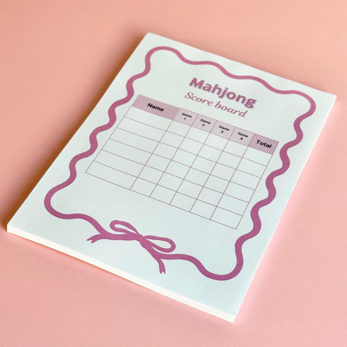 Mahjong score sheet with pink wavy border and bow