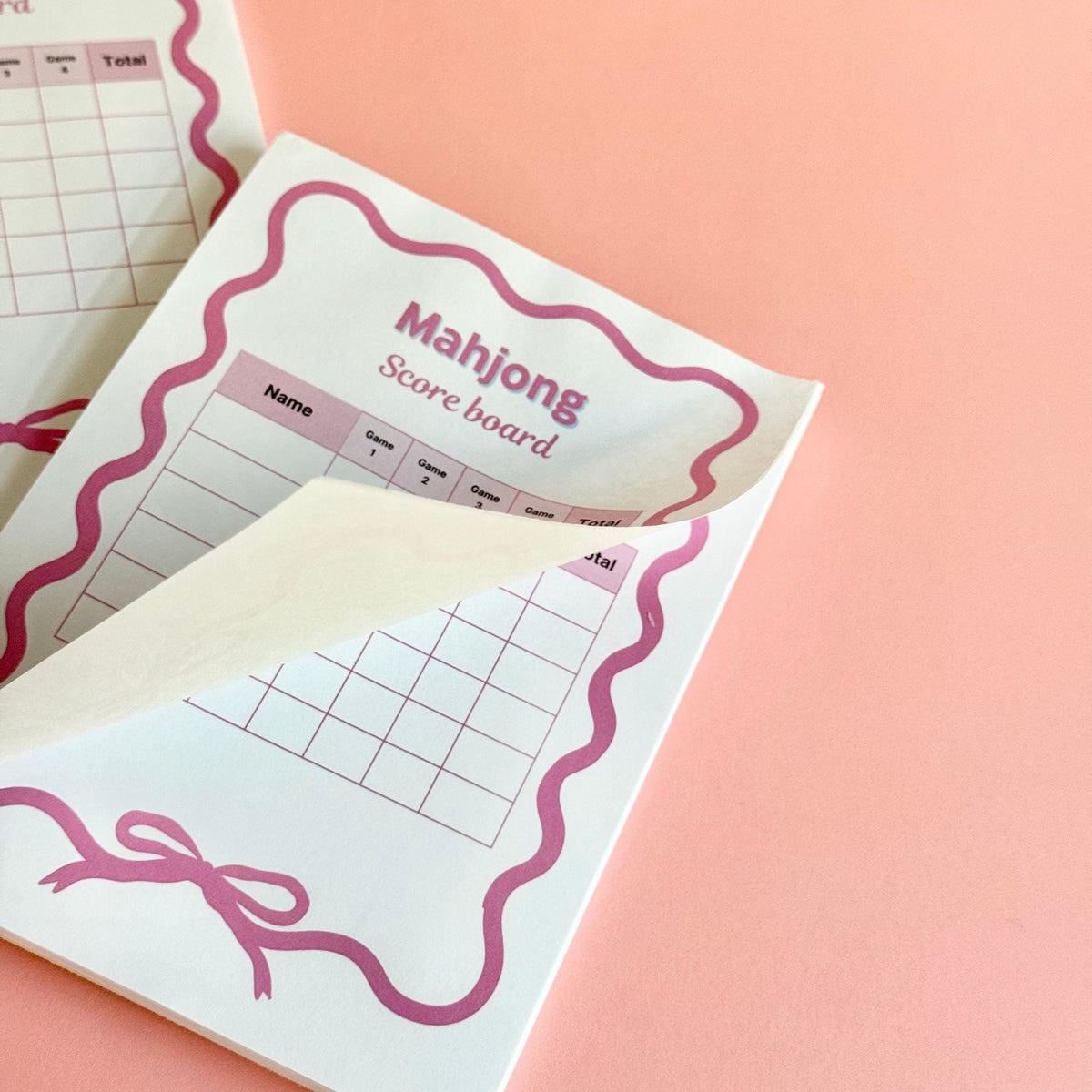 Mahjong score pads with pink decorative border