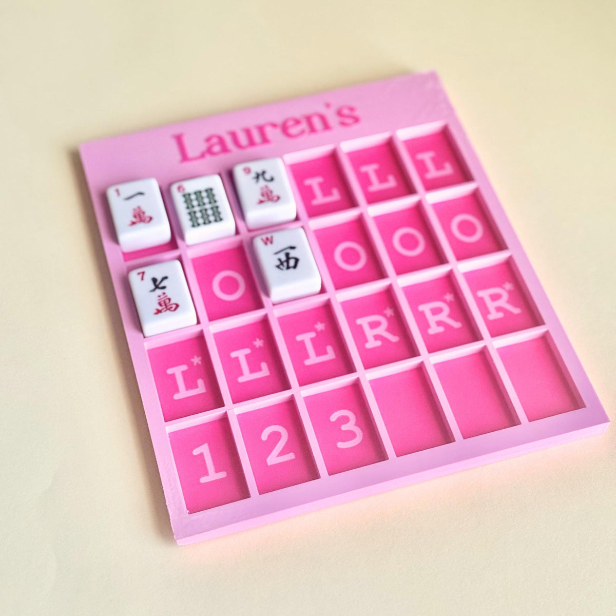 Pink Mahjong practice board with name and tile compartments