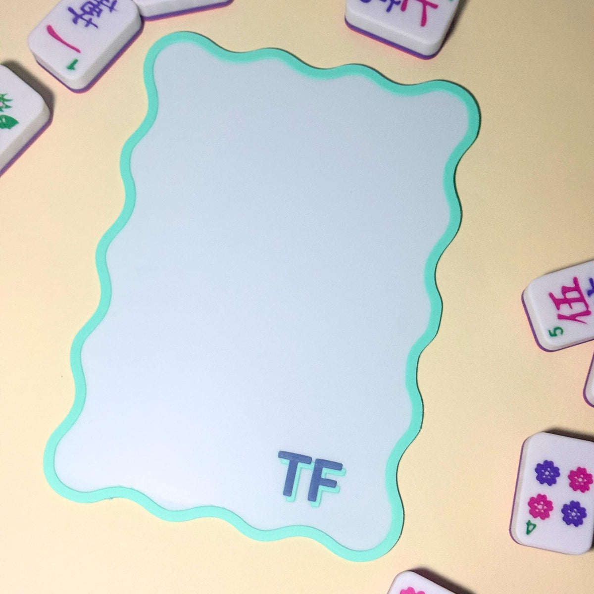 Light blue scalloped Mahjong shuffler with TF monogram