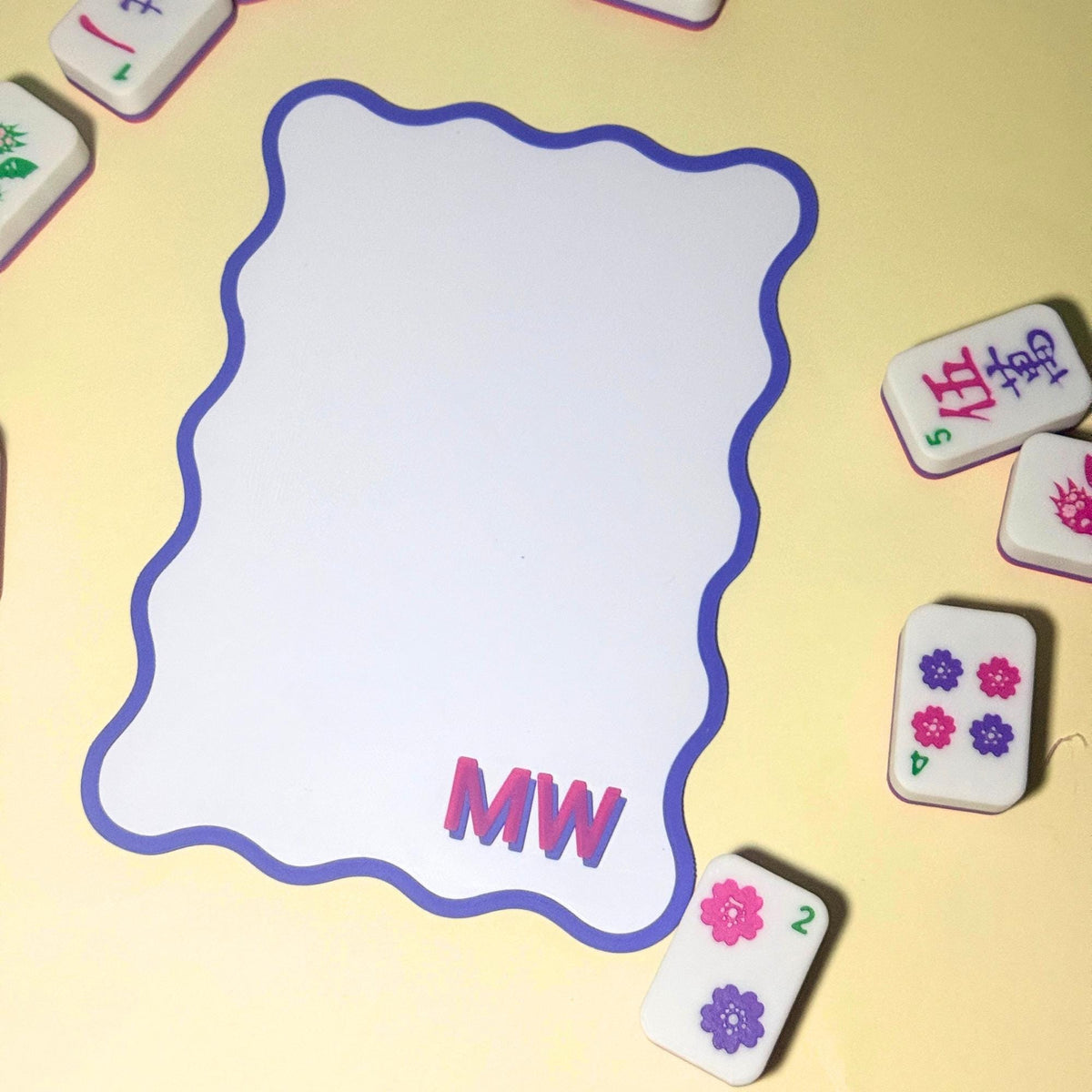 White Mahjong shuffler with blue scalloped border and monogram