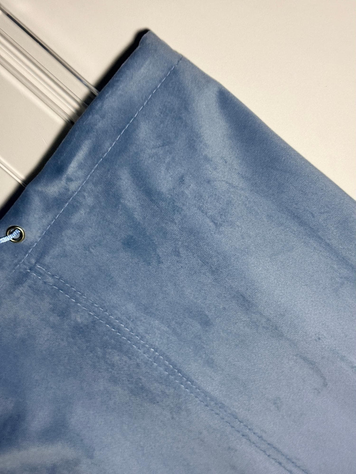 Dusty blue velvet fabric close-up