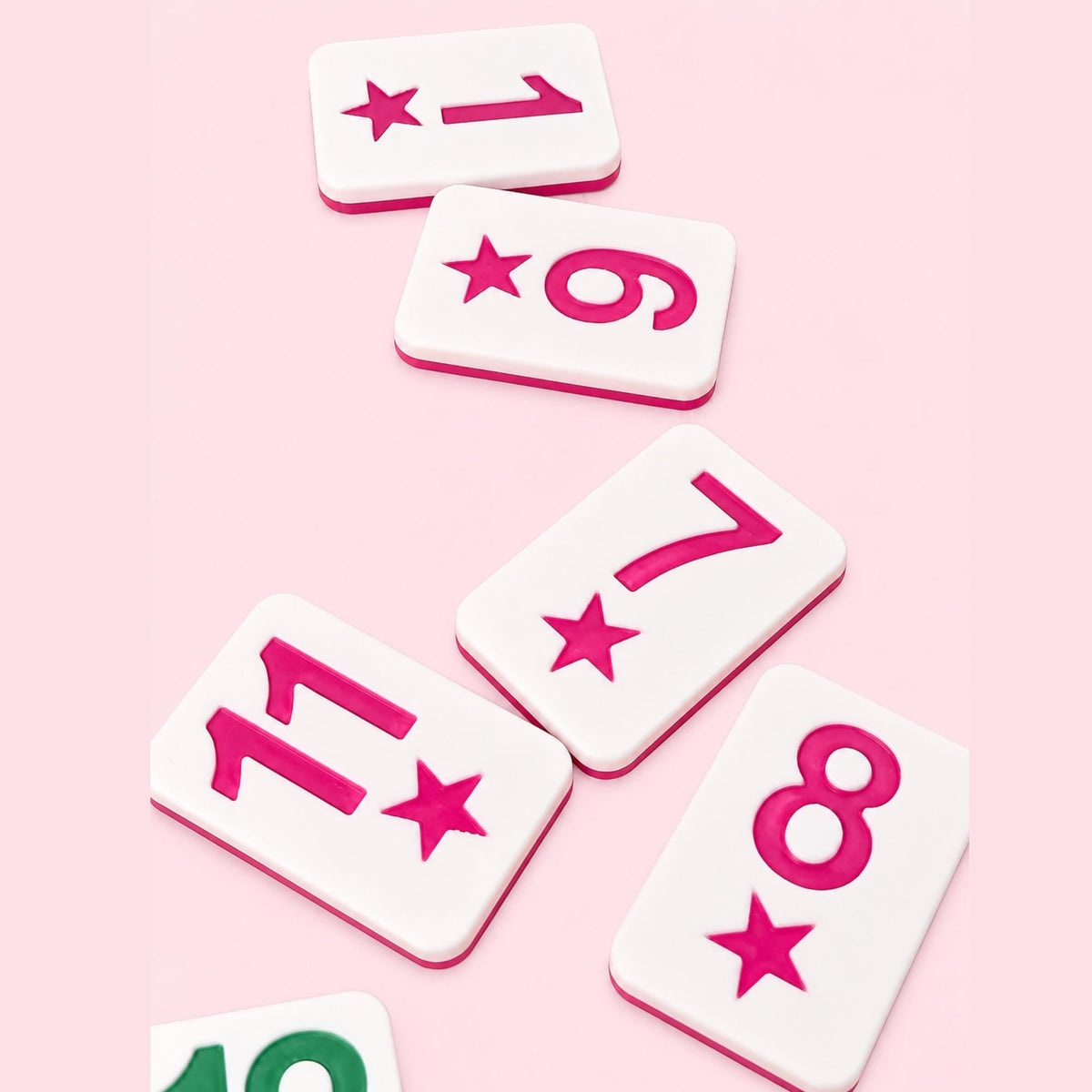Rummikub tile racks in pastel colors